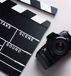 Clapboard and camera